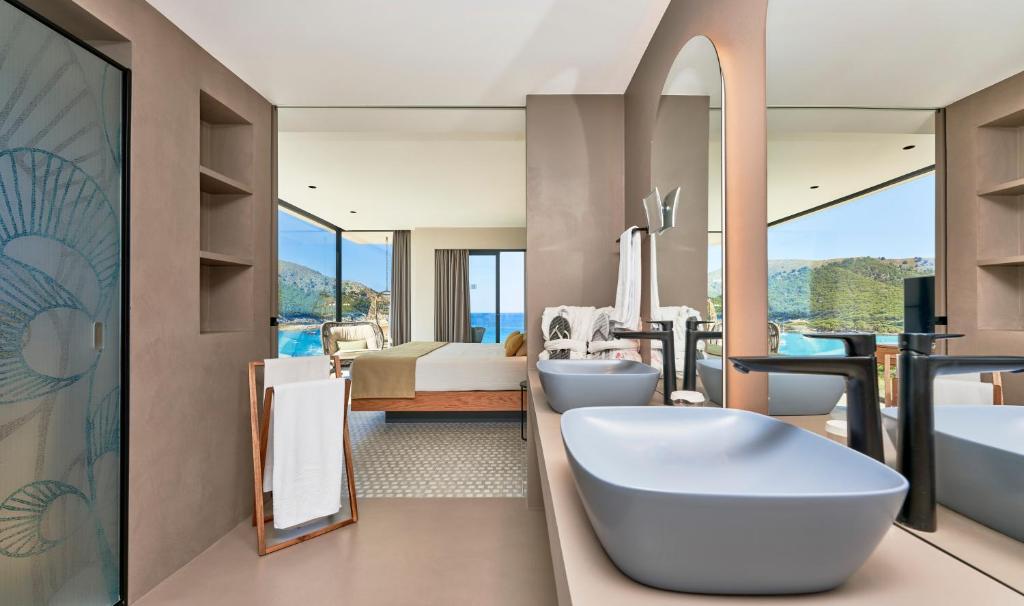 Suites hotel entrador - IONA projects